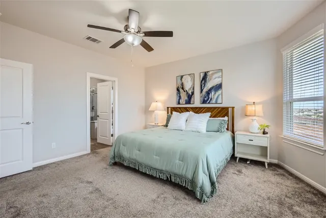 a bathroom with a sink double vanity and a mirror