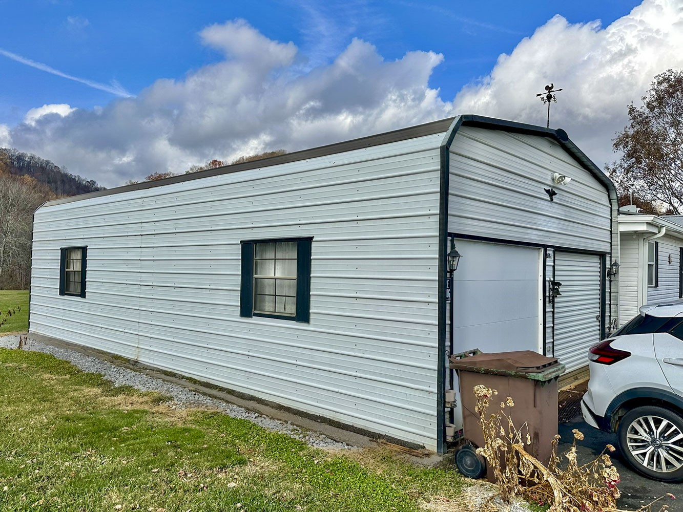 2641 Stanley Valley Road Surgoinsville, TN 37873 - Photo 5 of 26 a view of a house with backyard
