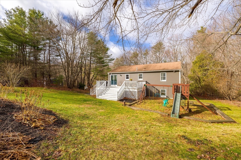 9 Hebert Road Spencer, MA 01562 - Photo 25 of 33 a view of a house with backyard and sitting area