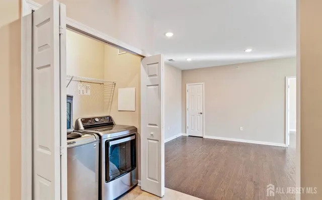 a view of kitchen and wooden floor