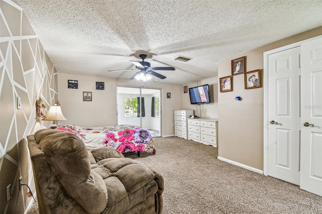 9741 Star Trail New Port Richey, FL 34654 - Photo 33 of 38 a bedroom with furniture and a window
