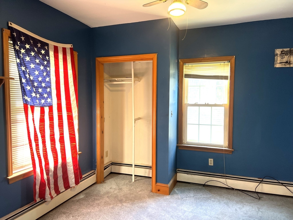 1261 G A R Highway Swansea, MA 02777 - Photo 14 of 25 a view of an empty room and window