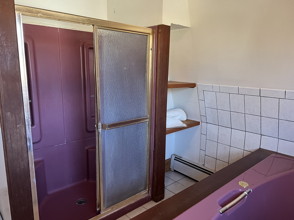 1261 G A R Highway Swansea, MA 02777 - Photo 25 of 25 a bathroom with a shower and a sink