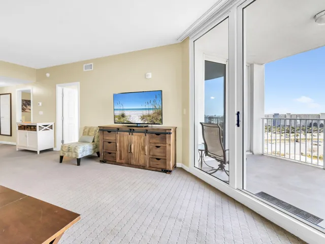 a bedroom with a bed and wall painting