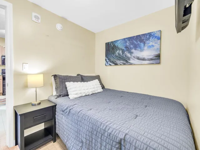 a bathroom with a shower and a toilet