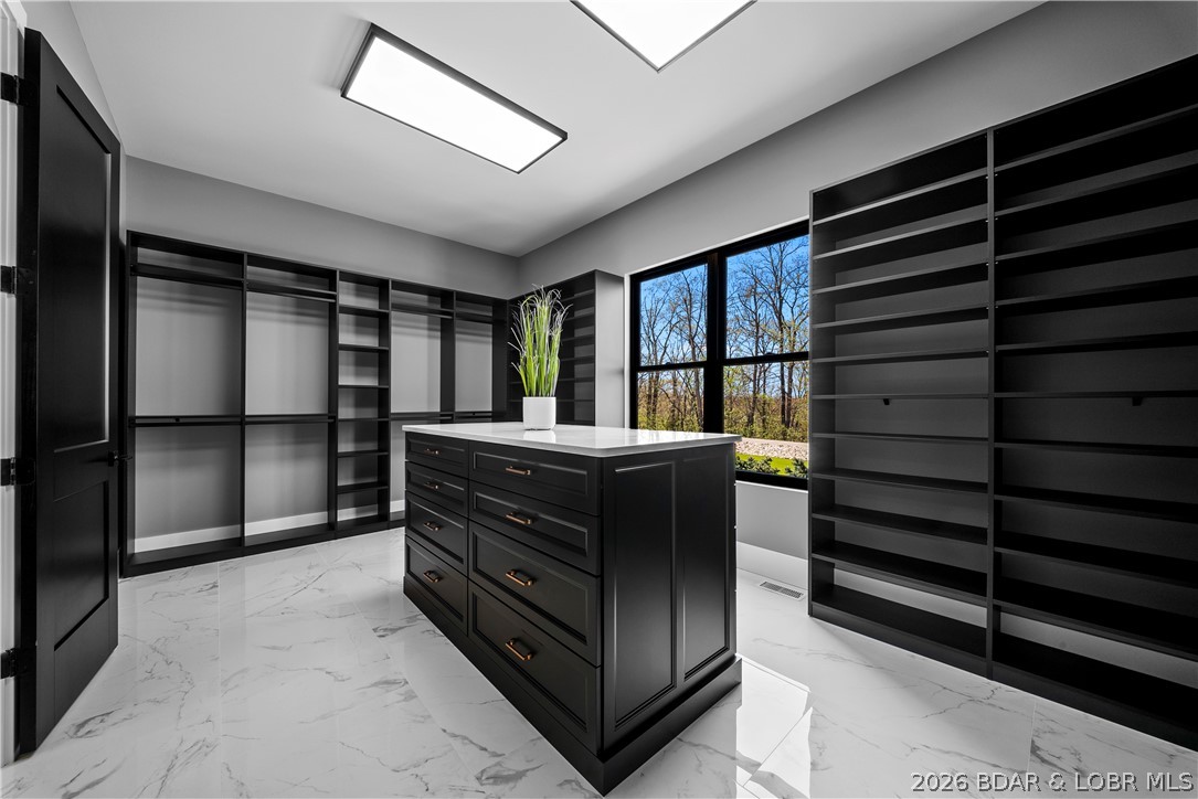 1356 Duckhead Road Lake Ozark, MO 65049 - Photo 41 of 99 Massive Walk-In Closet w/ Custom Closet System & Q