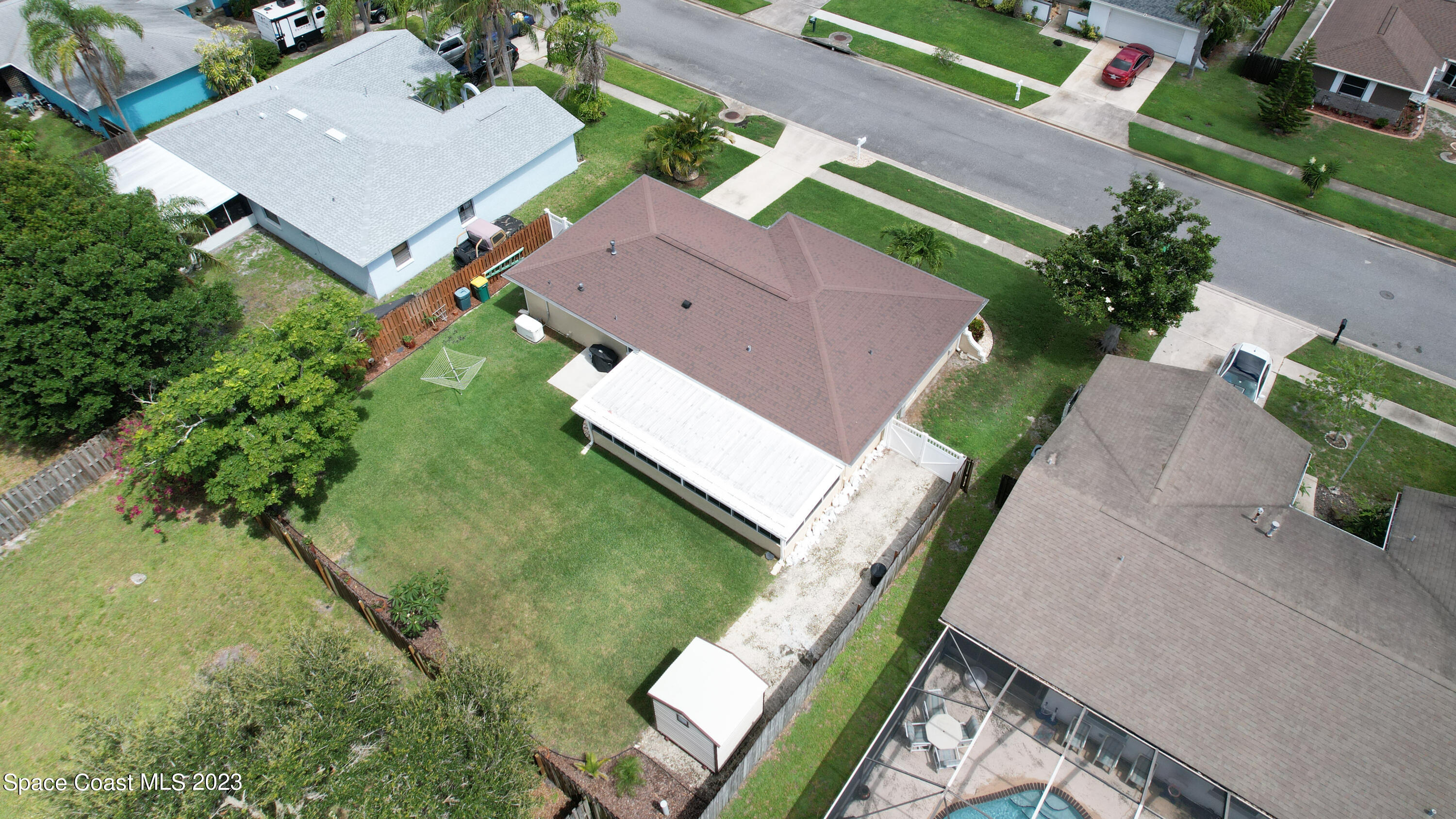 1919 Player Circle North Melbourne, FL 32935 - Photo 27 of 29 an aerial view of a house
