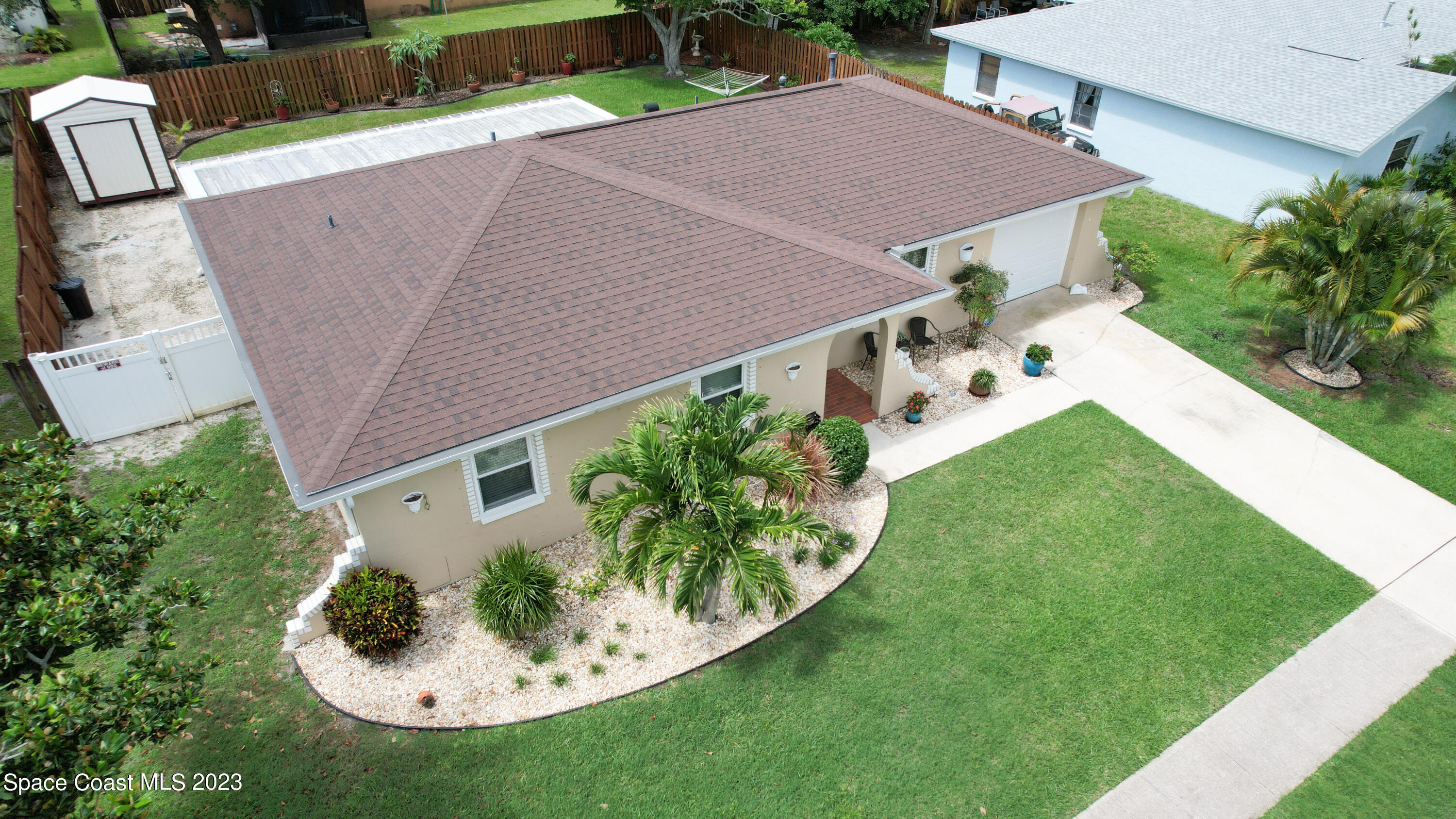 1919 Player Circle North Melbourne, FL 32935 - Photo 29 of 29 an aerial view of a house