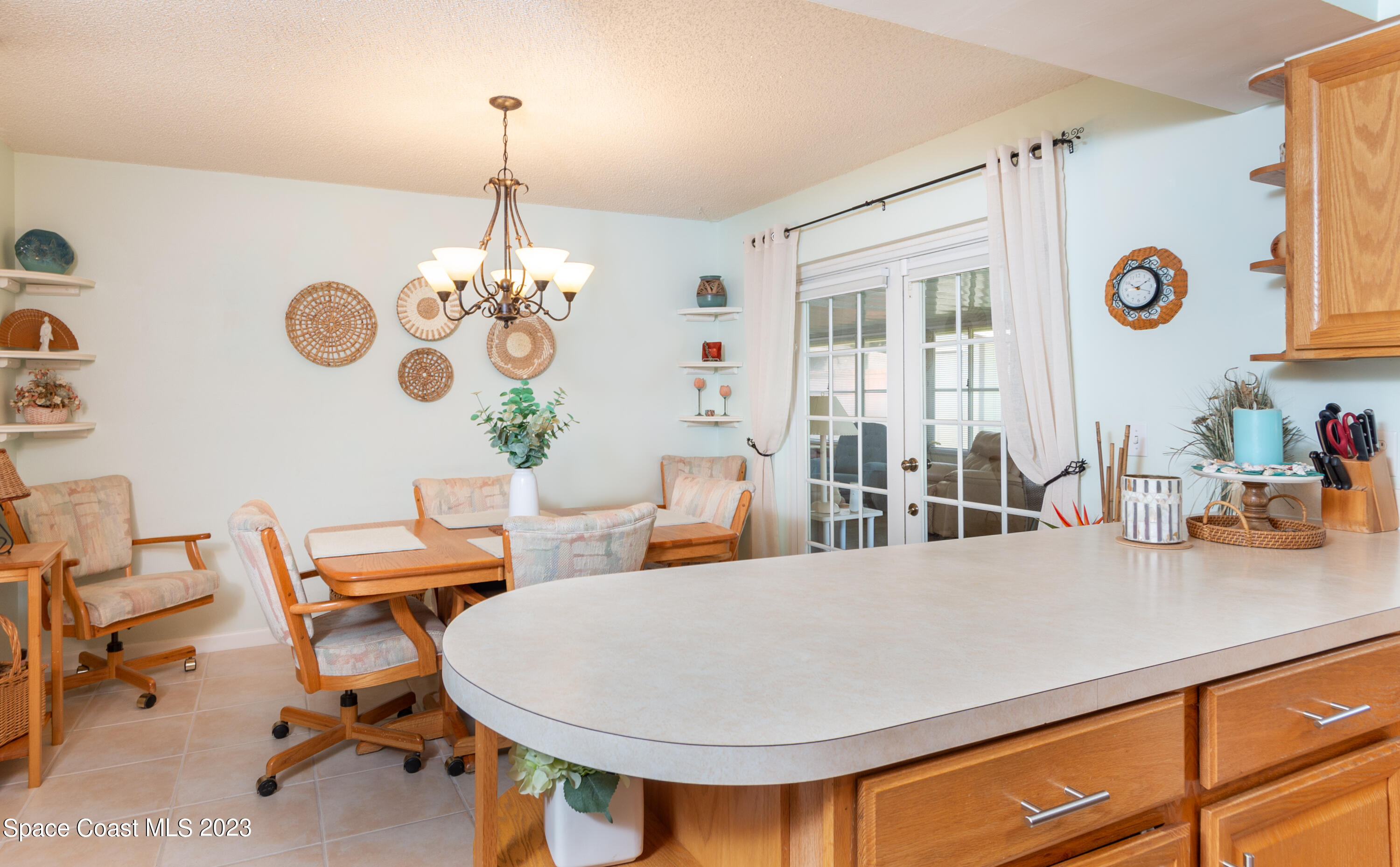 1919 Player Circle North Melbourne, FL 32935 - Photo 9 of 29 a very nice looking dining room with a table and chairs