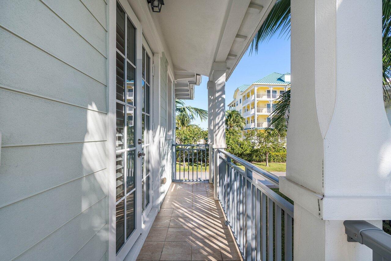 136 Ocean Breeze Drive Juno Beach, FL 33408 - Photo 21 of 30 a view of balcony and wooden floor