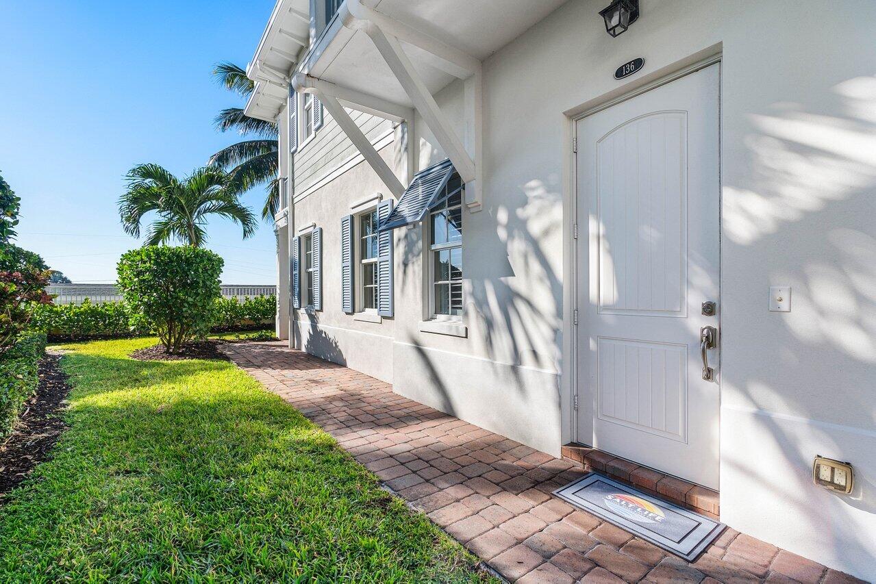 136 Ocean Breeze Drive Juno Beach, FL 33408 - Photo 4 of 30 a view of a back yard of the house