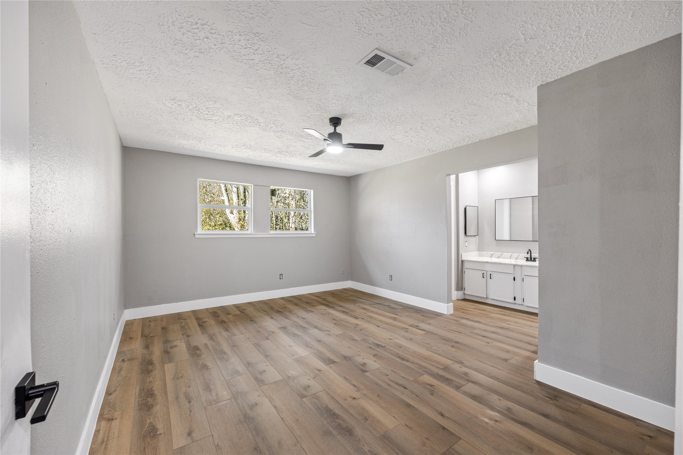 4515 Mossygate Drive Spring, TX 77373 - Photo 15 of 31 a view of empty room with wooden floor and fan