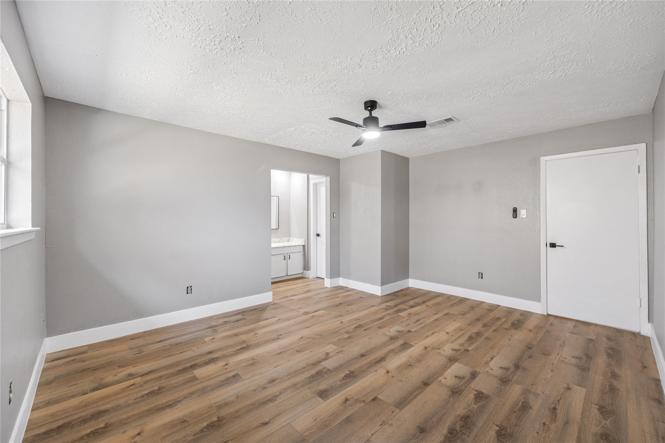 4515 Mossygate Drive Spring, TX 77373 - Photo 16 of 31 a view of an empty room with a window