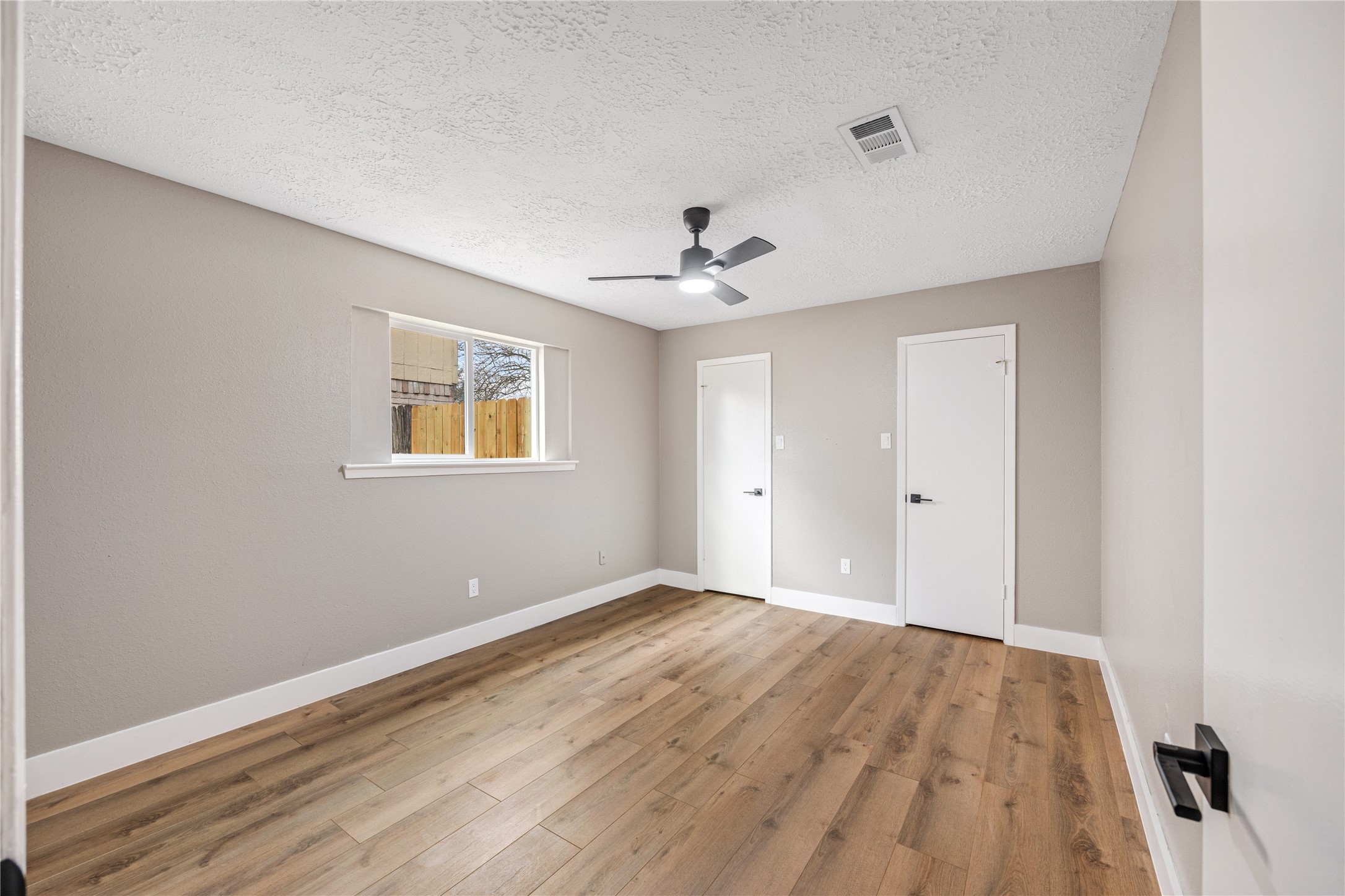 4515 Mossygate Drive Spring, TX 77373 - Photo 21 of 31 a view of an empty room with wooden floor