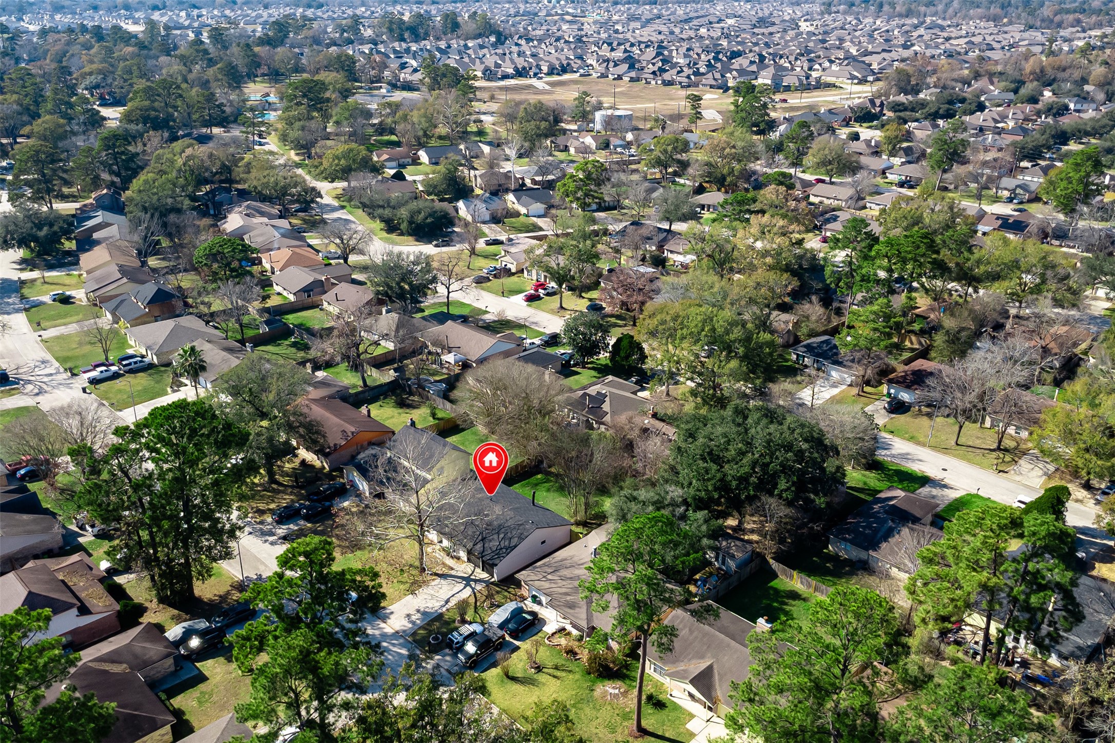 4515 Mossygate Drive Spring, TX 77373 - Photo 30 of 31 an aerial view of residential houses with outdoor space and trees