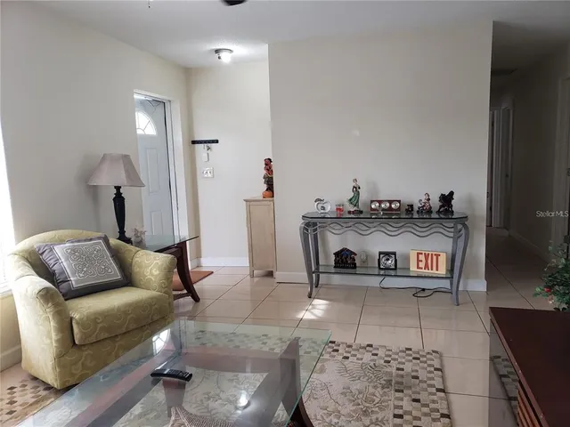 a living room with furniture and a couch