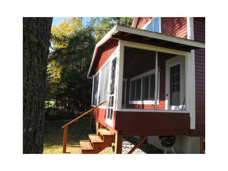 58 Shore Road Rangeley, ME 04970 - Photo 24 of 33 Patio/Deck. Screened-in porch is the...
