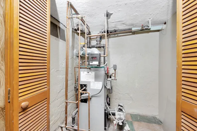 a view of a walk in closet and bedroom