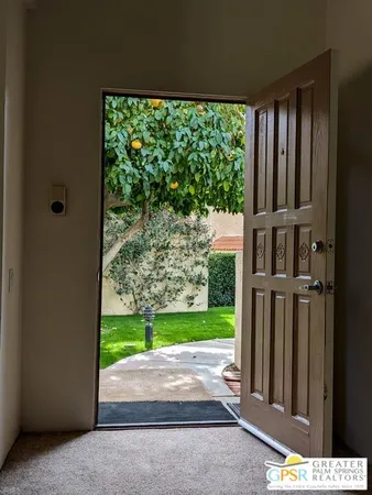 a view of porch with a yard