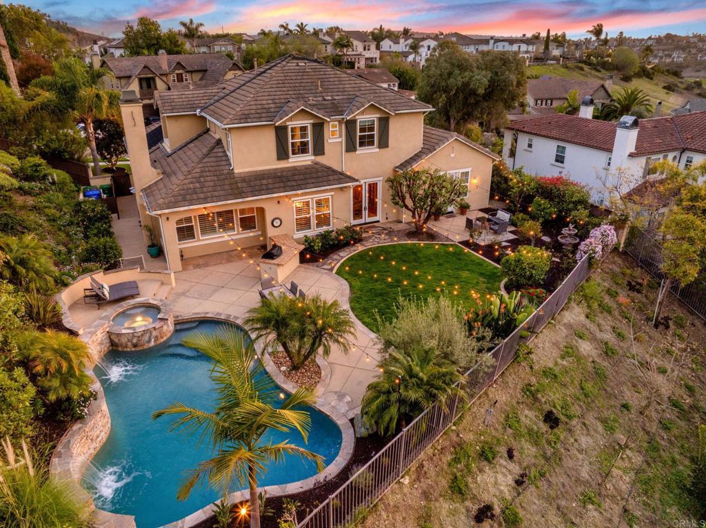2421 Lapis Road Carlsbad, CA 92009 - Photo 1 of 1 an aerial view of a house with a garden