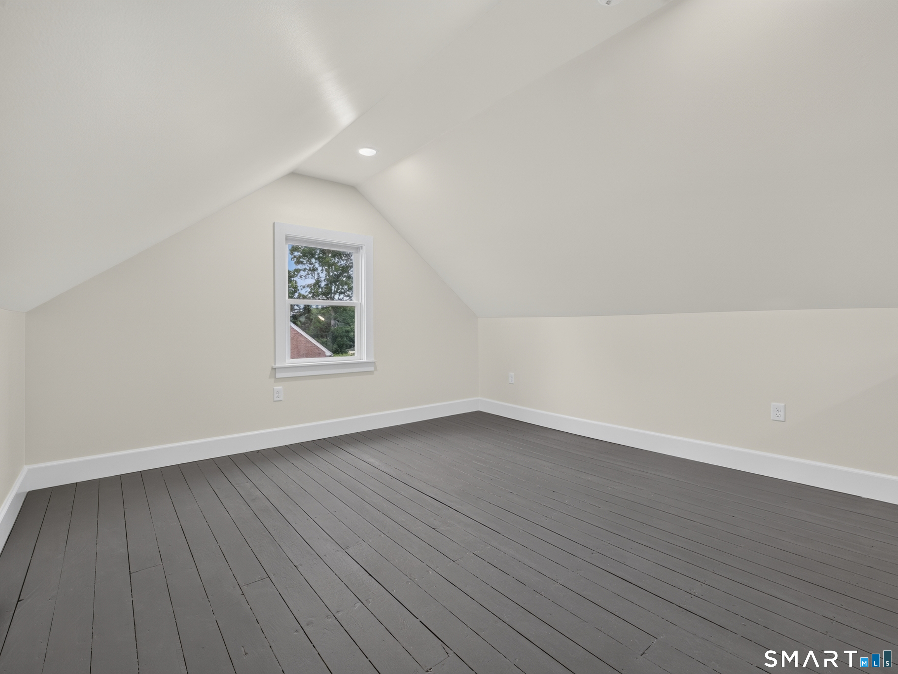1039 N Road Groton, CT 06340 - Photo 18 of 26 an empty room with wooden floor and windows