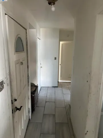 a view of a livingroom with a hallway