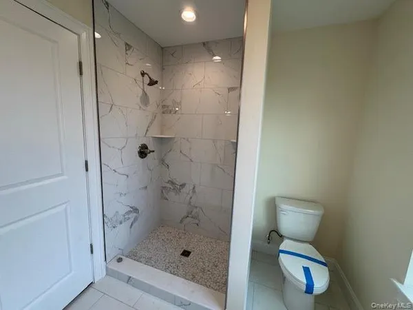 a view of an entryway with a door