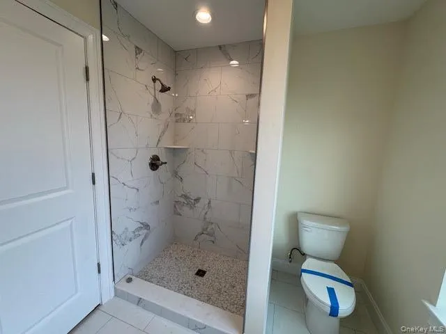 a view of an entryway with a door