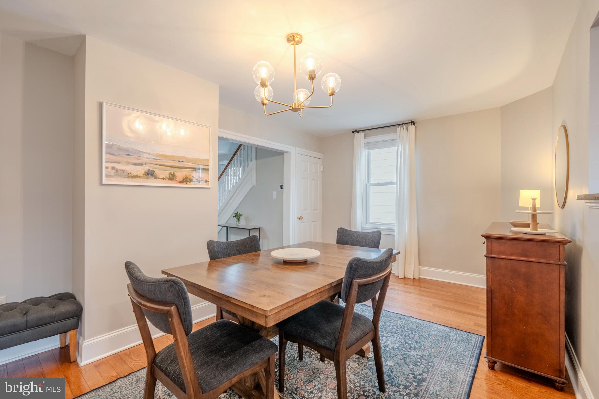 315 West Spring Avenue Ardmore, PA 19003 - Photo 12 of 42 a view of a dining room with furniture and wooden floor