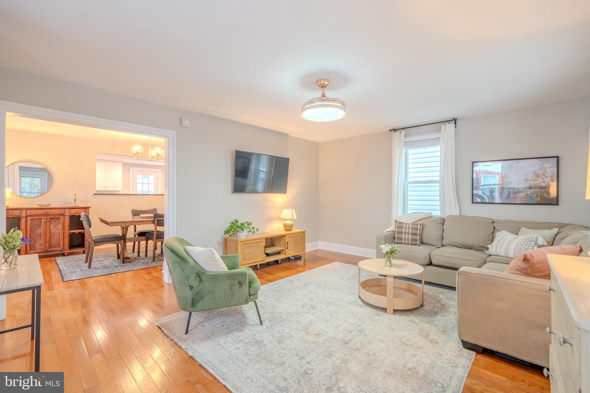 315 West Spring Avenue Ardmore, PA 19003 - Photo 5 of 42 a living room with furniture and a flat screen tv