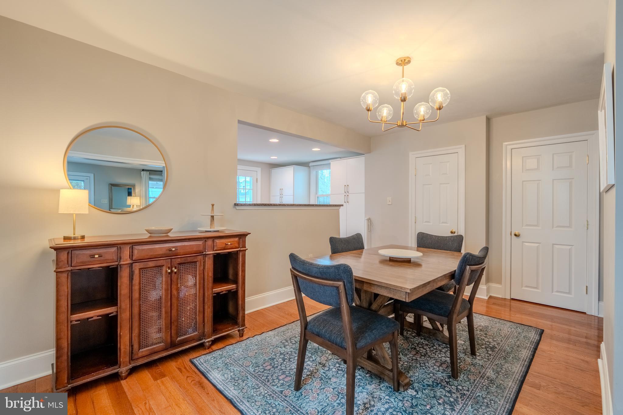 315 West Spring Avenue Ardmore, PA 19003 - Photo 10 of 42 a view of a dining room with furniture and chandelier