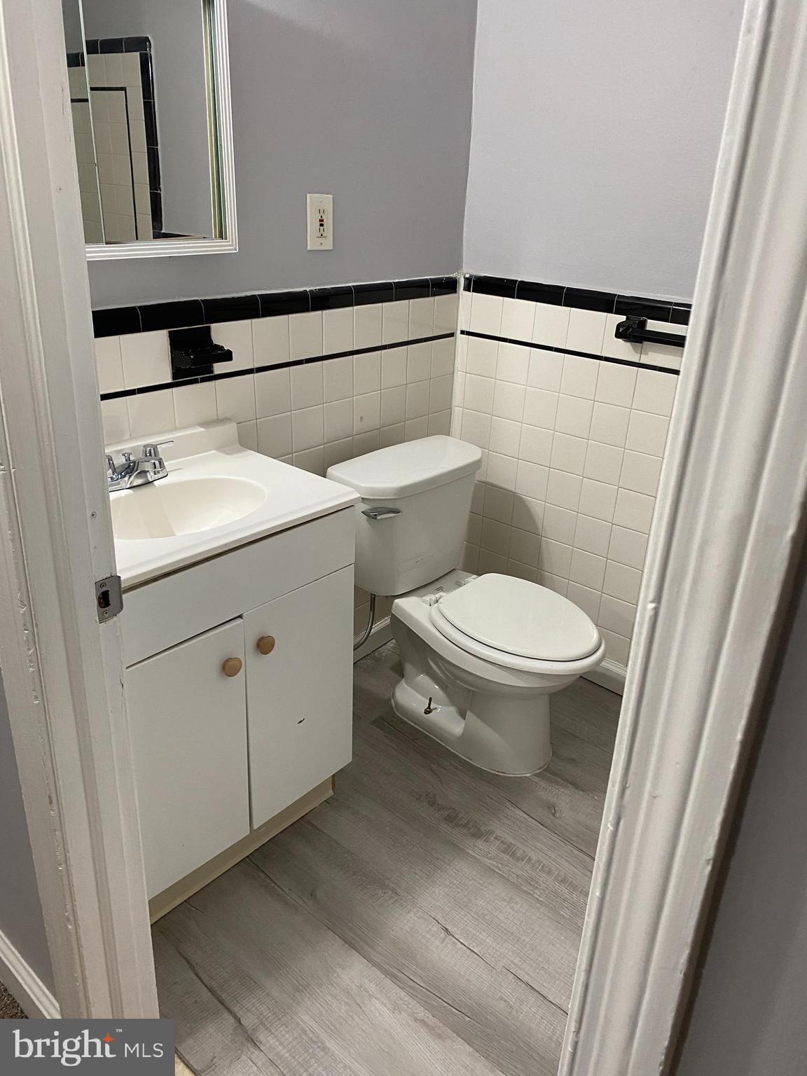 240 East Avon Road Brookhaven, PA 19015 - Photo 6 of 10 a bathroom with a sink a toilet and a mirror