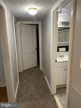a white refrigerator freezer sitting inside of a kitchen