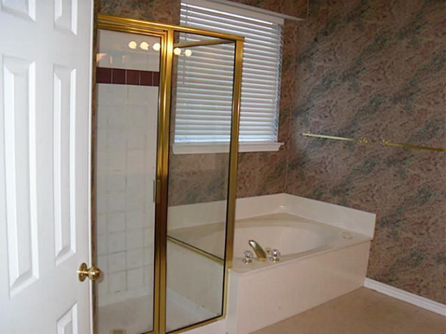 3824 Lowrey Way Plano, TX 75025 - Photo 9 of 10 a bath tub sitting next to a shower