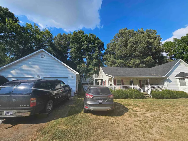 a car parked in front of a house
