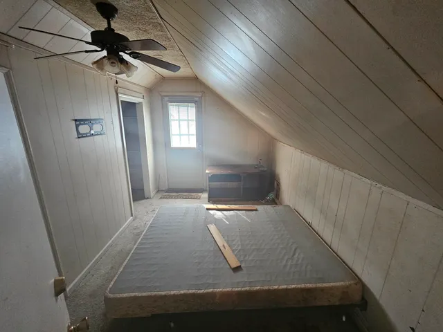 a room with lots of different colored cloths