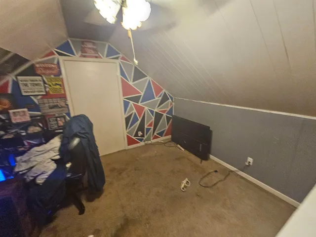 a bathroom with a shower and a sink