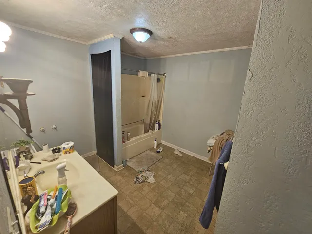 a bathroom with a toilet and a sink