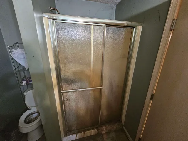 a view of empty room with windows