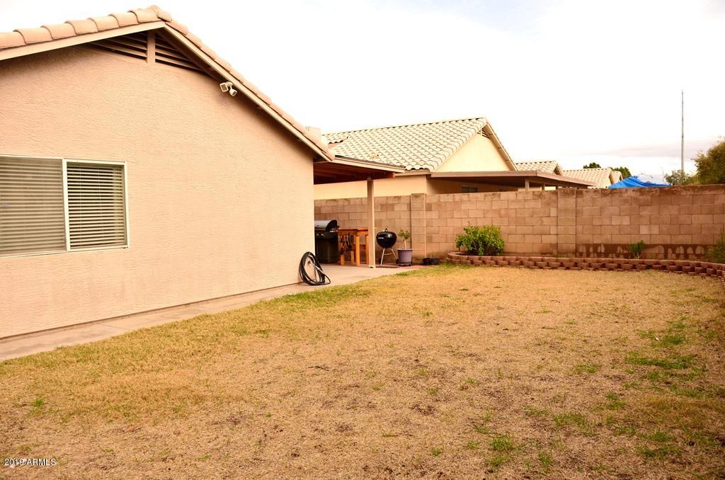 5101 Casper Road Mesa, AZ 85205 - Photo 4 of 17 a view of a house with a yard