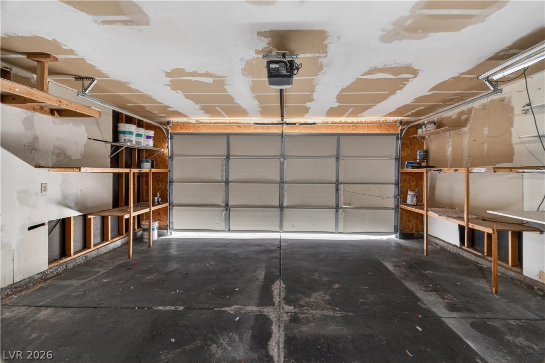 3156 Terrace View Drive Laughlin, NV 89029 - Photo 51 of 94 Functional garage with overhead door opener and convenient built-in shelving provides ample storage.