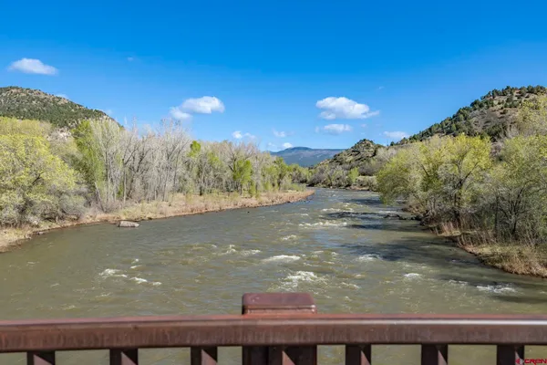 a view of balcony with furniture