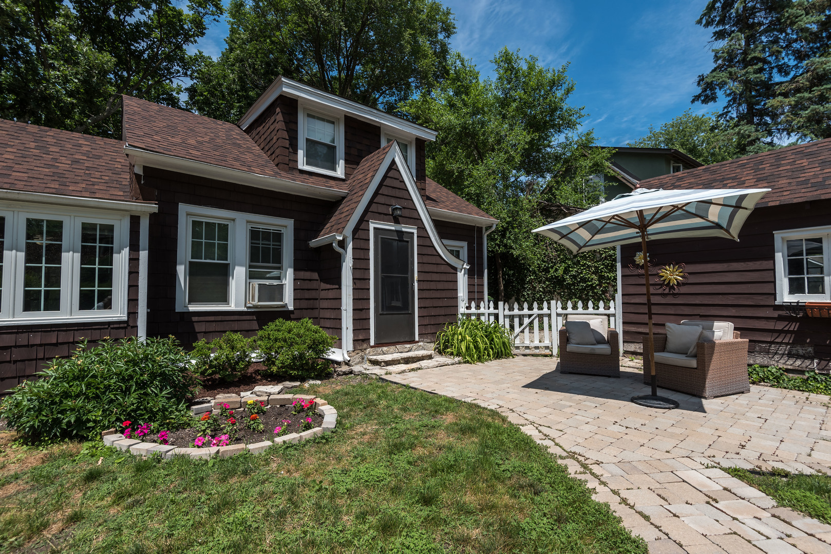 2109 Colfax Street Evanston, IL 60201 - Photo 12 of 12 a front view of a house with a garden