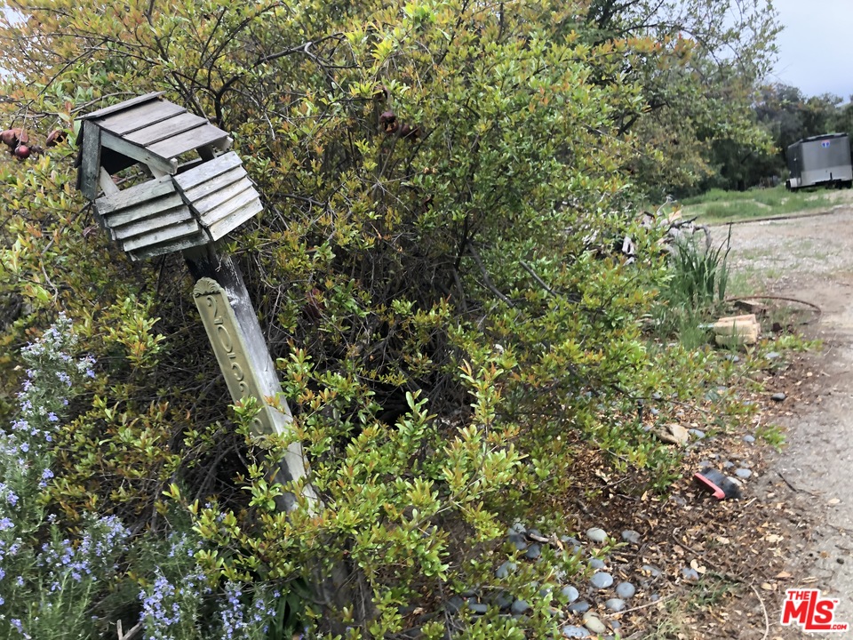 20526 Callon Drive Topanga, CA 90290 - Photo 18 of 30 a view of a yard with a fence