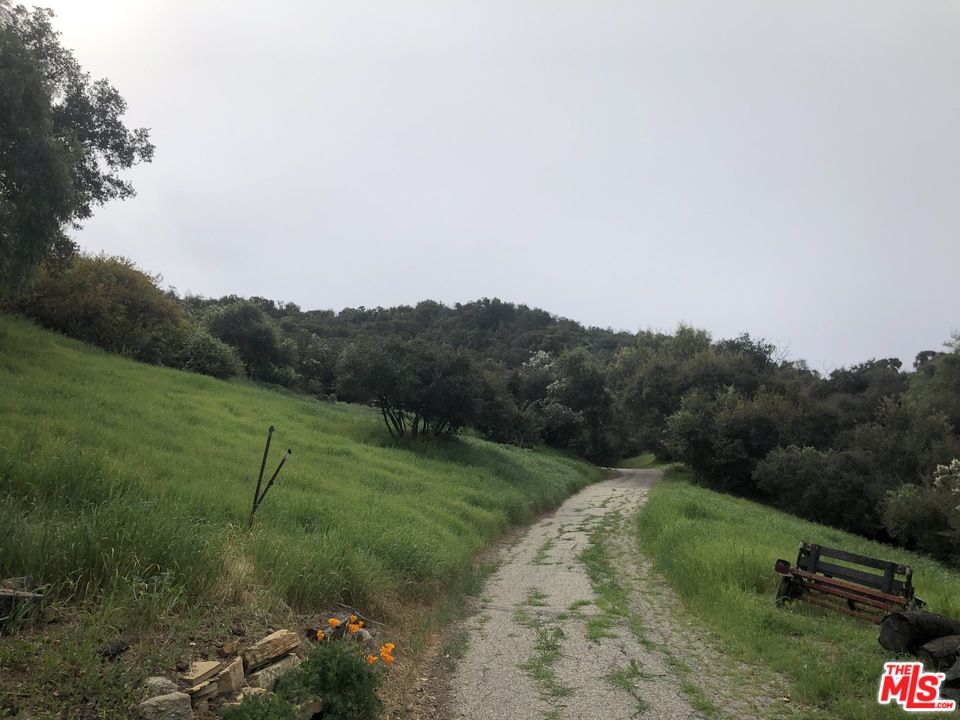 20526 Callon Drive Topanga, CA 90290 - Photo 7 of 30 a view of a grassy area with mountains