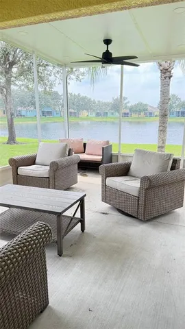 a view of parking garage with cars parked