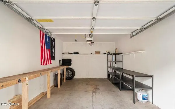 a view of storage and utility room with stairs