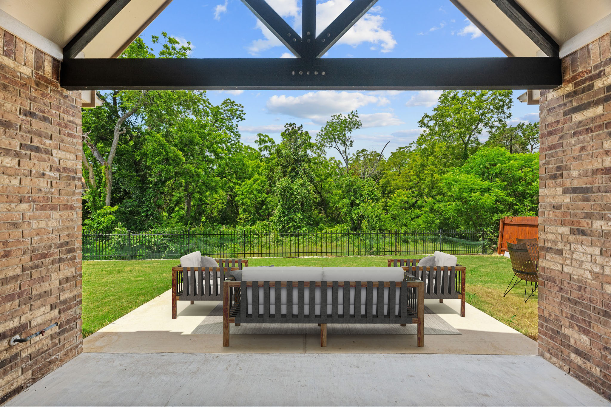 2709 Steece Way Leander, TX 78641 - Photo 3 of 39 a view of a chair and table in the patio
