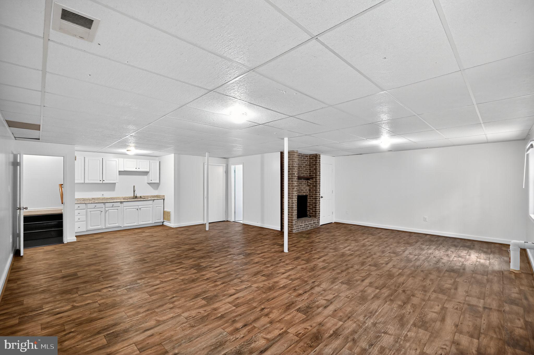 5084 Fairview Lane Broad Run, VA 20137 - Photo 24 of 44 Basement family room w/fireplace