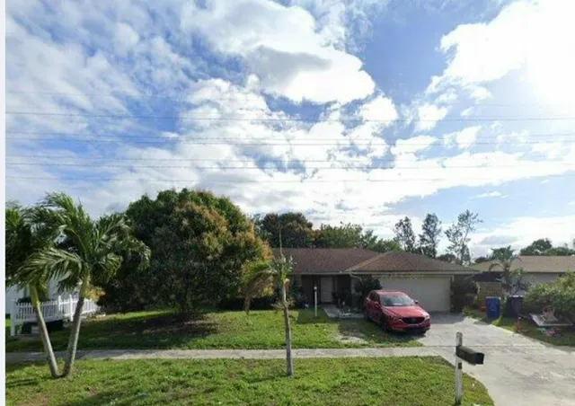 $390,000 | 2551 Canterbury Drive South, Riviera Beach, FL 33407